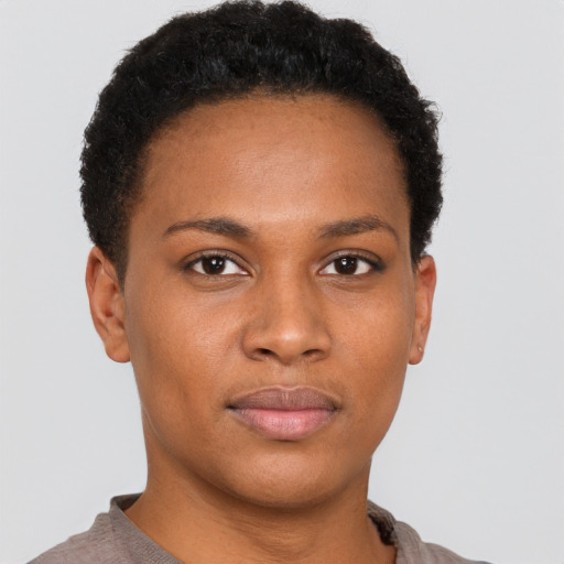 Neutral black young-adult female with short  brown hair and brown eyes