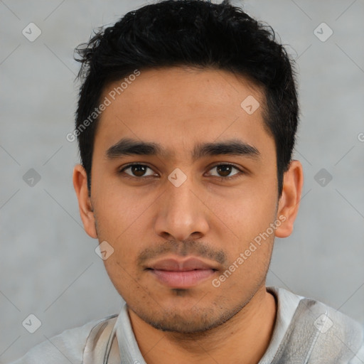 Neutral latino young-adult male with short  black hair and brown eyes