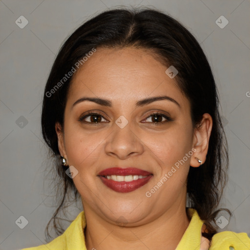 Joyful latino young-adult female with medium  brown hair and brown eyes