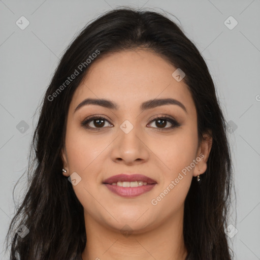 Joyful latino young-adult female with long  brown hair and brown eyes