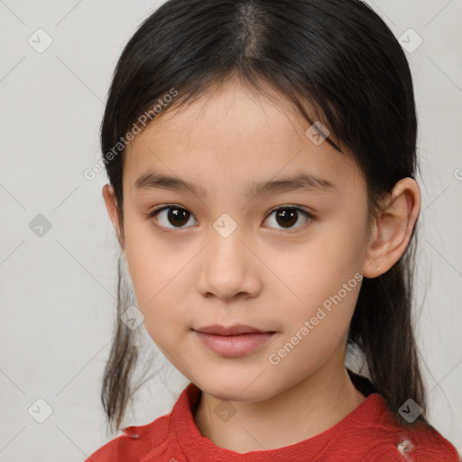 Joyful white child female with medium  brown hair and brown eyes