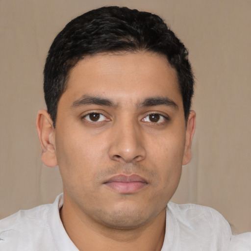 Neutral latino young-adult male with short  black hair and brown eyes