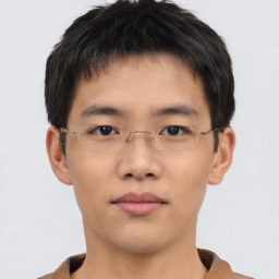 Neutral asian young-adult male with short  brown hair and brown eyes