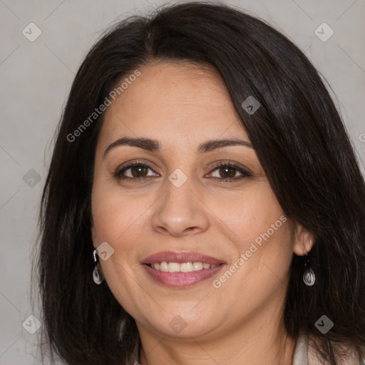 Joyful white adult female with long  brown hair and brown eyes