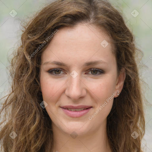 Joyful white young-adult female with long  brown hair and green eyes