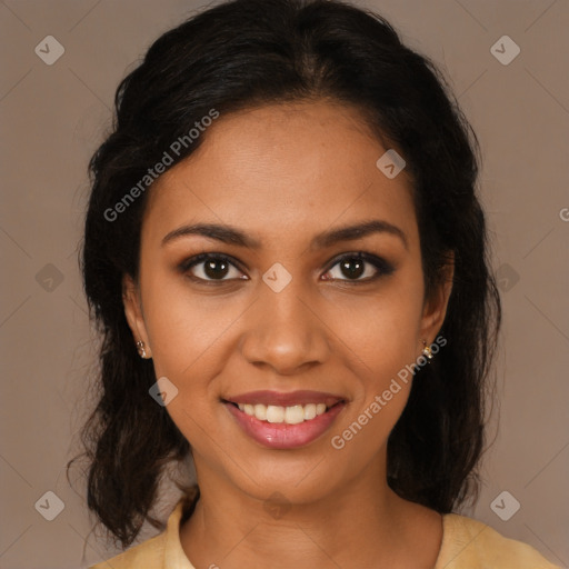 Joyful black young-adult female with medium  brown hair and brown eyes