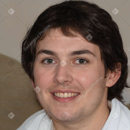 Joyful white young-adult male with medium  brown hair and brown eyes