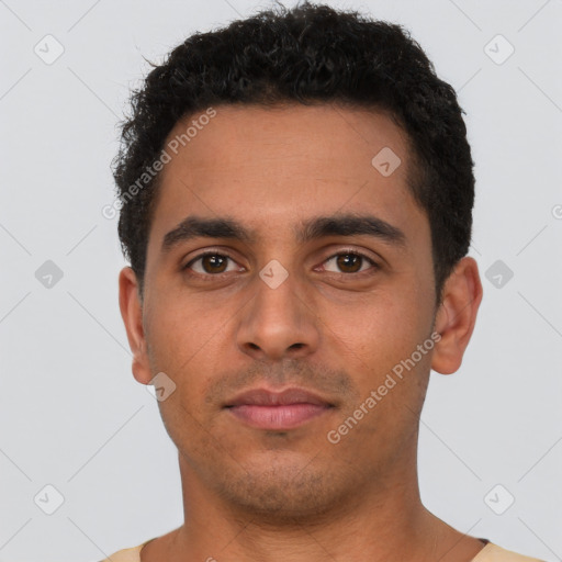 Neutral latino young-adult male with short  black hair and brown eyes