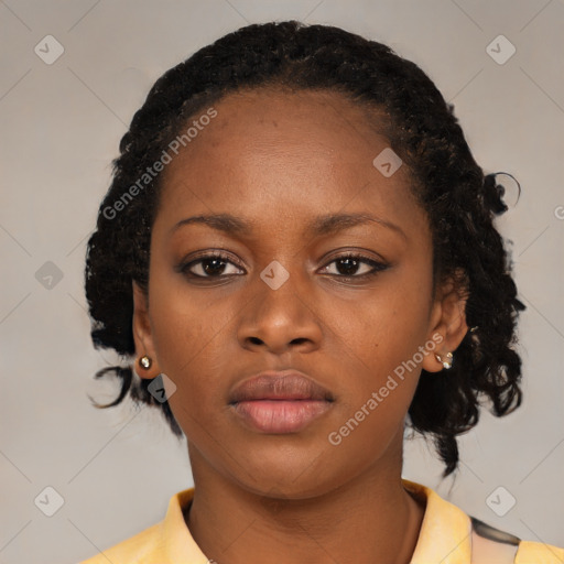 Neutral black young-adult female with medium  black hair and brown eyes