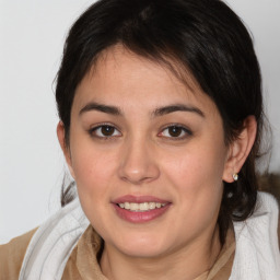 Joyful white young-adult female with medium  brown hair and brown eyes