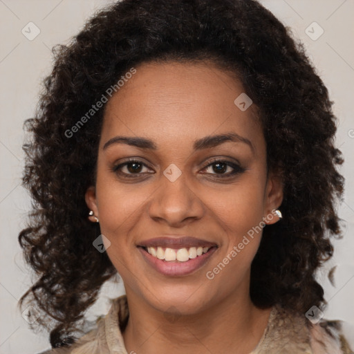 Joyful black young-adult female with medium  brown hair and brown eyes