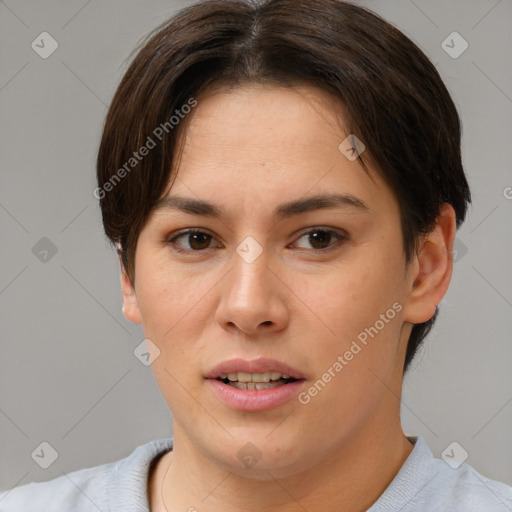 Joyful white young-adult female with short  brown hair and brown eyes