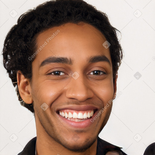 Joyful latino young-adult male with short  brown hair and brown eyes