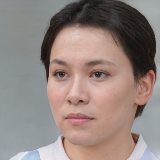 Neutral white young-adult female with short  brown hair and brown eyes