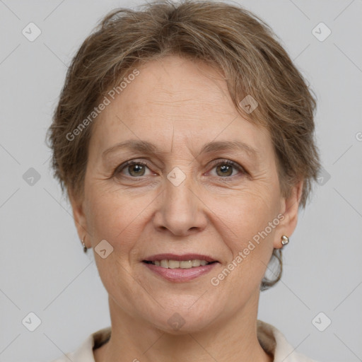 Joyful white adult female with short  brown hair and brown eyes