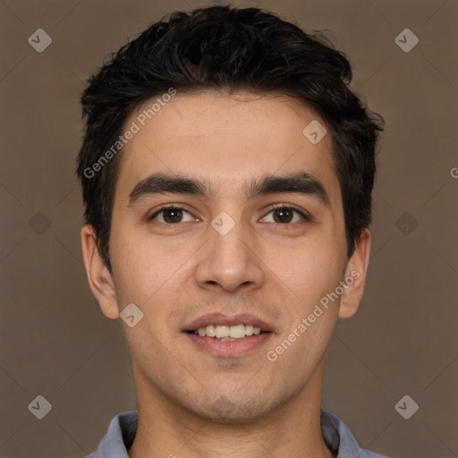 Joyful white young-adult male with short  black hair and brown eyes