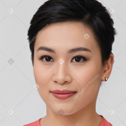 Joyful asian young-adult female with short  brown hair and brown eyes