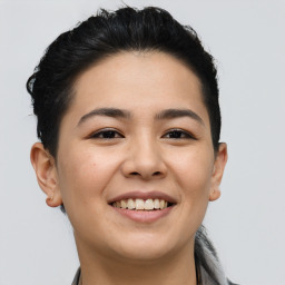 Joyful asian young-adult female with short  black hair and brown eyes