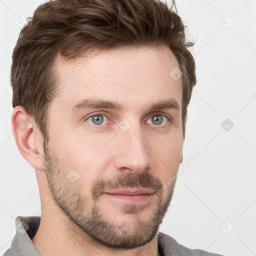 Neutral white young-adult male with short  brown hair and grey eyes