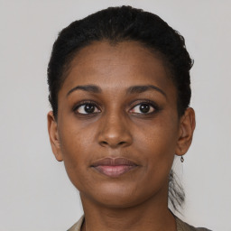 Neutral black young-adult female with short  brown hair and brown eyes