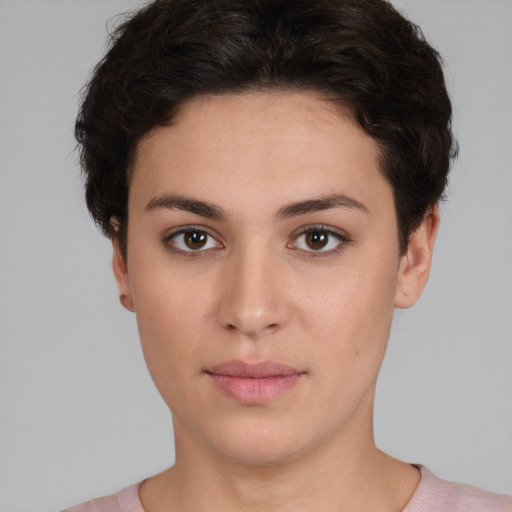Neutral white young-adult female with short  brown hair and brown eyes