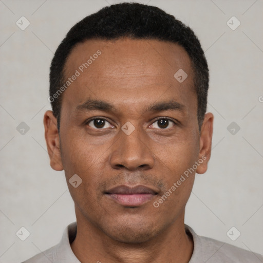 Neutral latino young-adult male with short  black hair and brown eyes