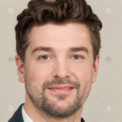 Joyful white adult male with short  brown hair and grey eyes