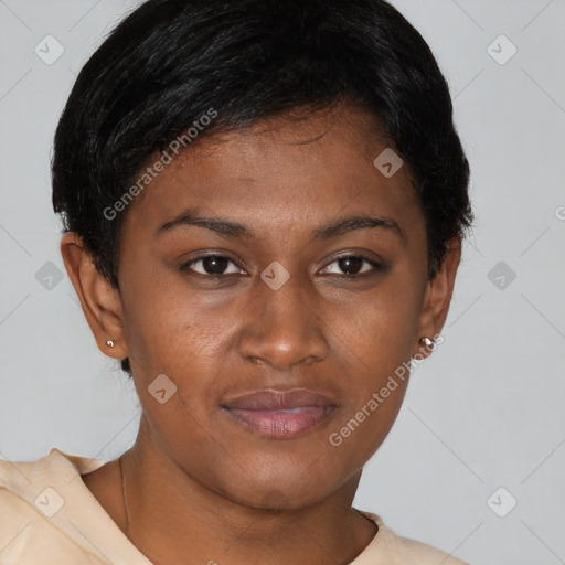 Joyful black young-adult female with short  brown hair and brown eyes