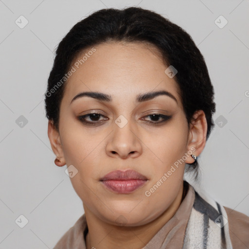 Joyful latino young-adult female with medium  brown hair and brown eyes