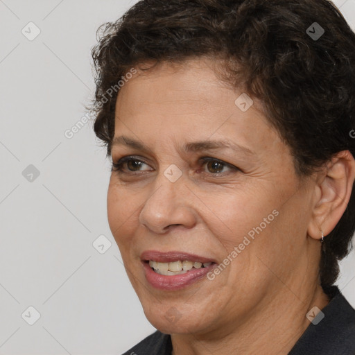 Joyful white adult female with short  brown hair and brown eyes