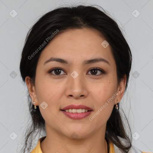 Joyful latino young-adult female with medium  brown hair and brown eyes