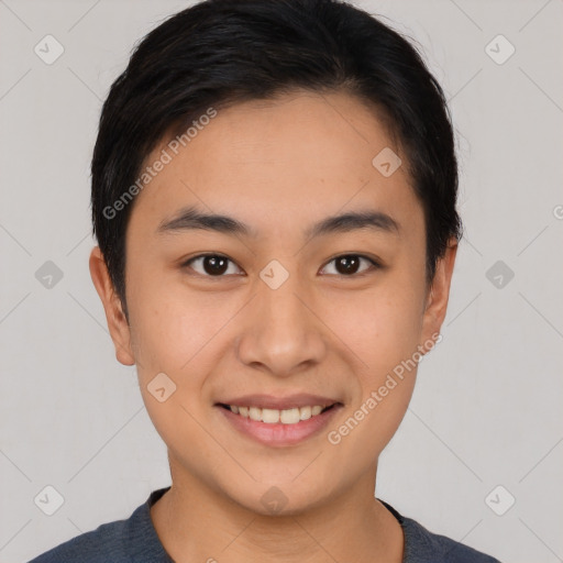 Joyful asian young-adult male with short  brown hair and brown eyes