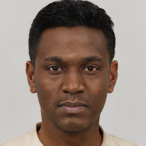 Neutral black young-adult male with short  black hair and brown eyes