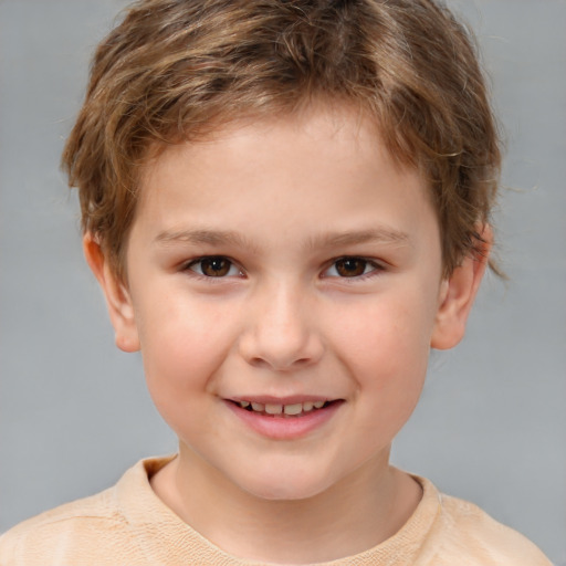 Joyful white child male with short  brown hair and brown eyes