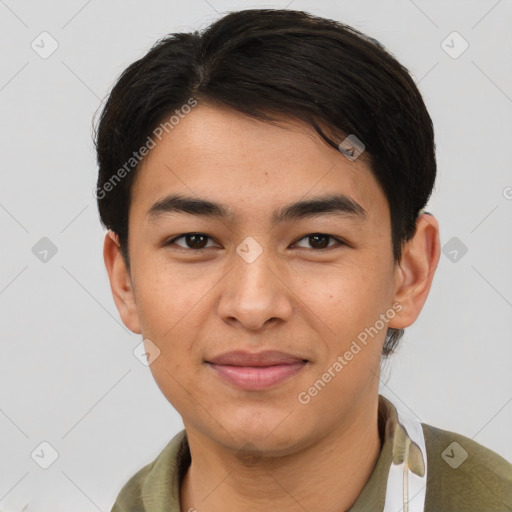 Joyful asian young-adult male with short  brown hair and brown eyes