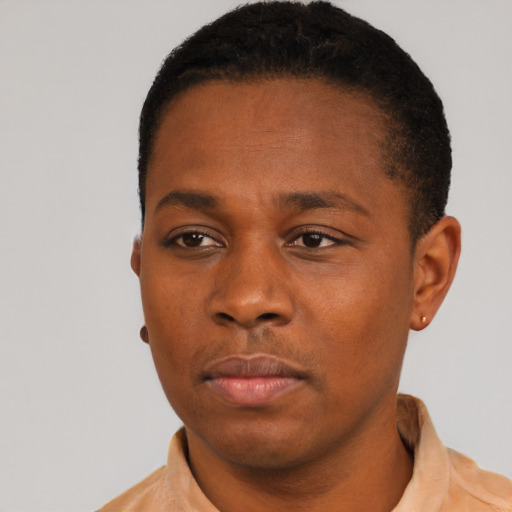 Neutral black young-adult male with short  black hair and brown eyes