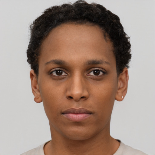 Neutral black young-adult female with short  brown hair and brown eyes