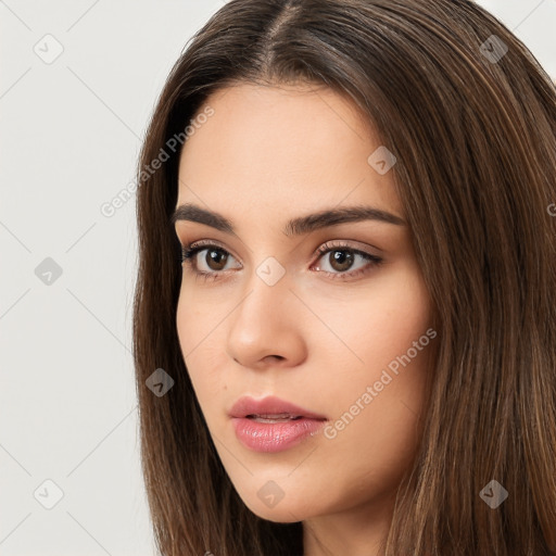 Neutral white young-adult female with long  brown hair and brown eyes