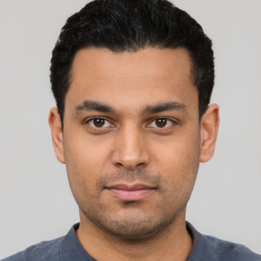 Neutral latino young-adult male with short  black hair and brown eyes