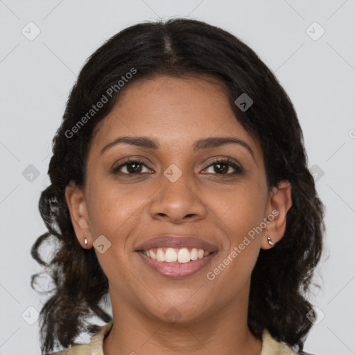 Joyful black young-adult female with medium  brown hair and brown eyes