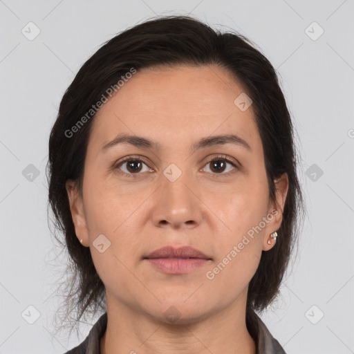 Joyful white adult female with medium  brown hair and brown eyes