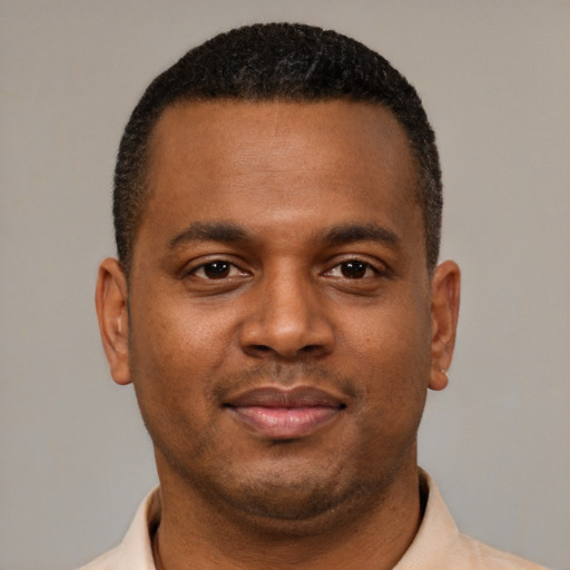 Neutral latino young-adult male with short  brown hair and brown eyes