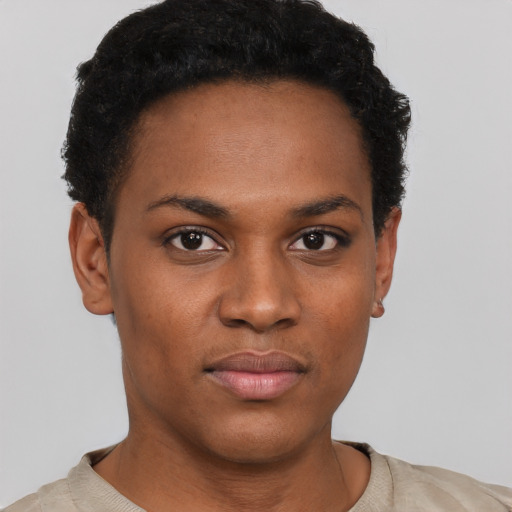 Neutral black young-adult female with short  black hair and brown eyes