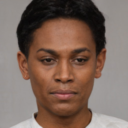 Neutral latino young-adult female with short  black hair and brown eyes