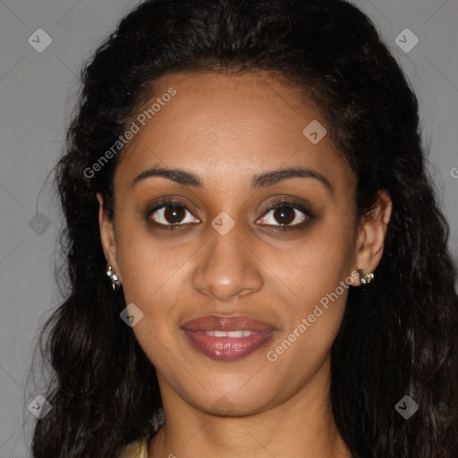 Joyful black young-adult female with long  brown hair and brown eyes