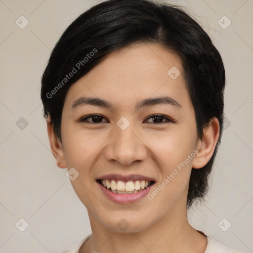 Joyful asian young-adult female with medium  black hair and brown eyes