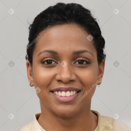 Joyful latino young-adult female with short  brown hair and brown eyes