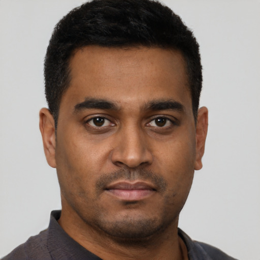 Neutral black young-adult male with short  brown hair and brown eyes