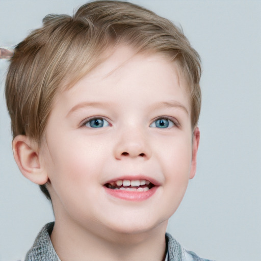 Joyful white child male with short  brown hair and blue eyes