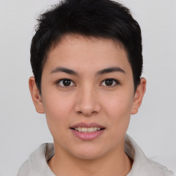 Joyful asian young-adult female with short  black hair and brown eyes